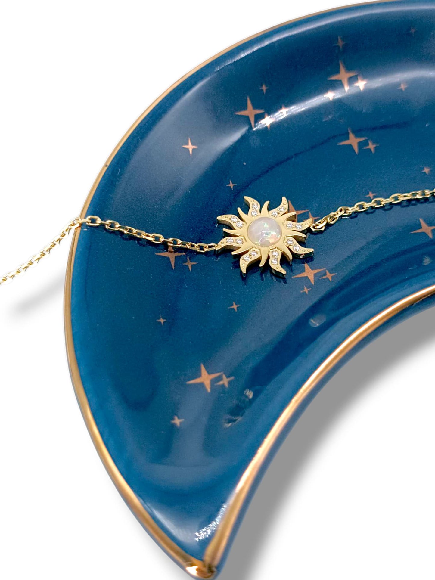 Zoom sur la gourmette Vaillante dorée avec une opalite - Gémeaux Maroc