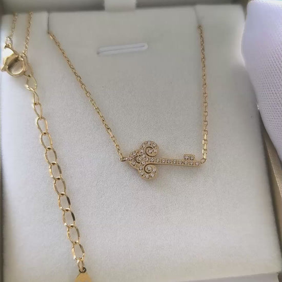 collier clé céleste sertie video